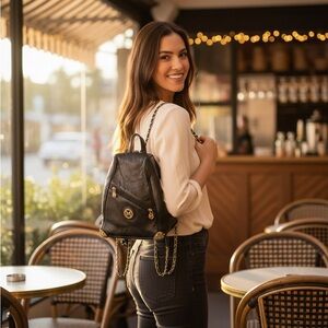 Chic Black Leather Backpack with Chain Straps